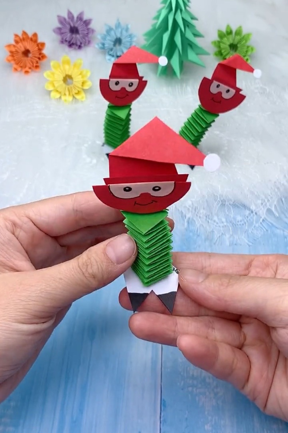 Finished bouncy accordion paper spring Santa toy standing upright