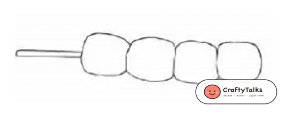 Step 2: Adding a bamboo skewer stick piercing through the center with rounded tip