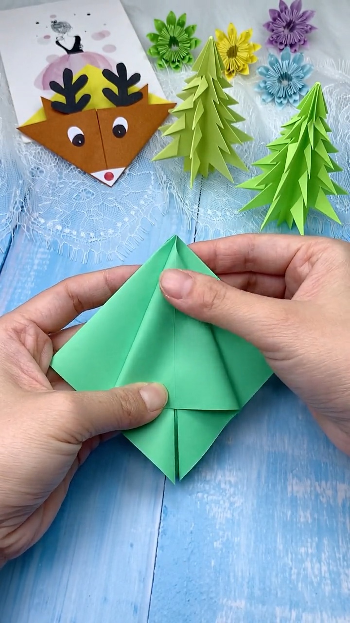 Step 2 Collapsing Creased Paper into a Preliminary Origami Square Base