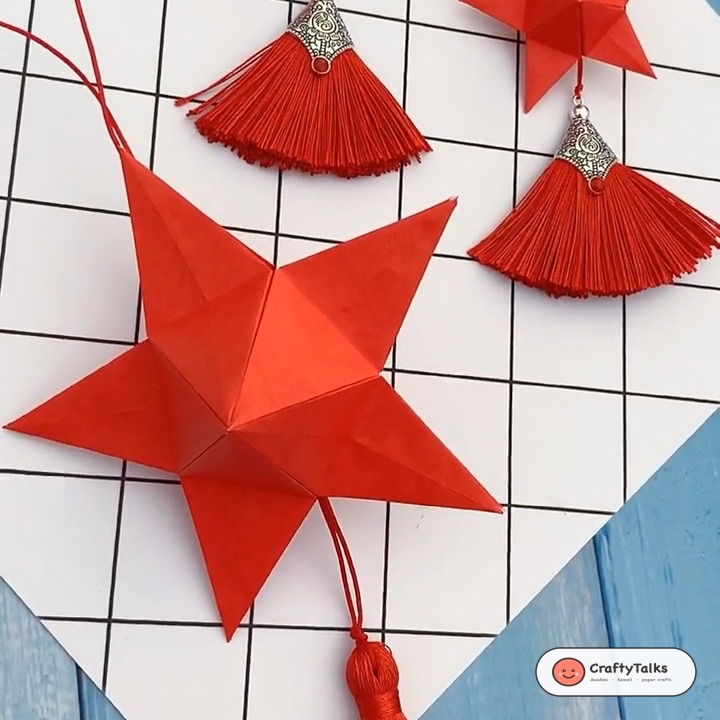 Step 1: Looping the origami paper strip into an overhand single knot to form a flat pentagon base