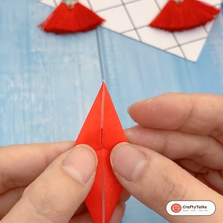 Step 3: Wrapping the long remaining paper strip neatly around the alternating five facets of the pentagon