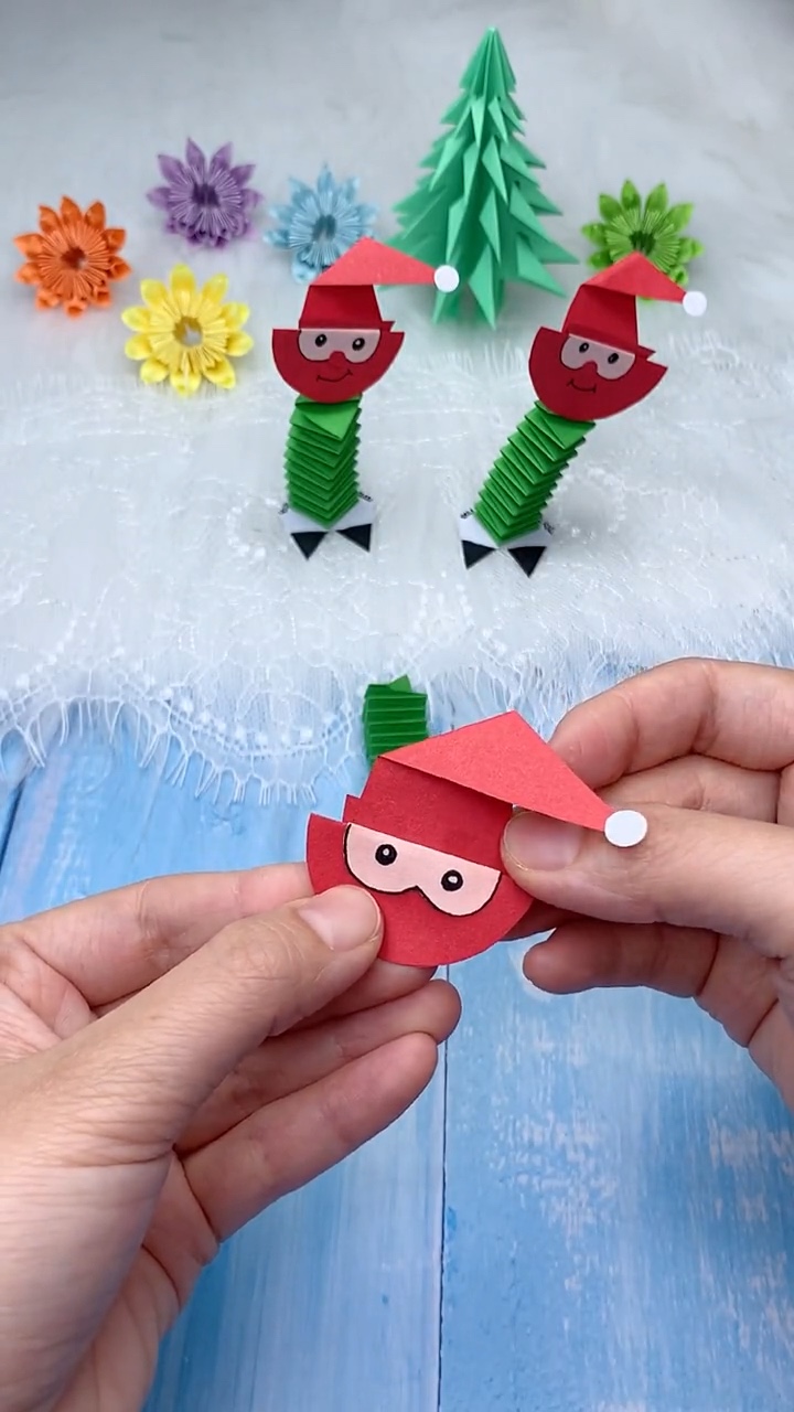 Step 5: Fold Pointed Red Hat with White Pompom