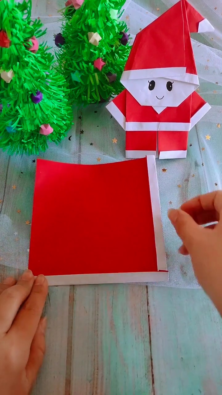 Step 1 Folding White Fur Margins on Red Origami Square