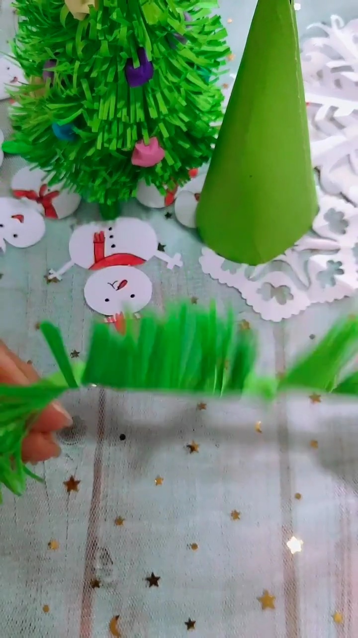 Step 3 Unfolding and Gently Fluffing the Bushy Green Fringe Garland Strip