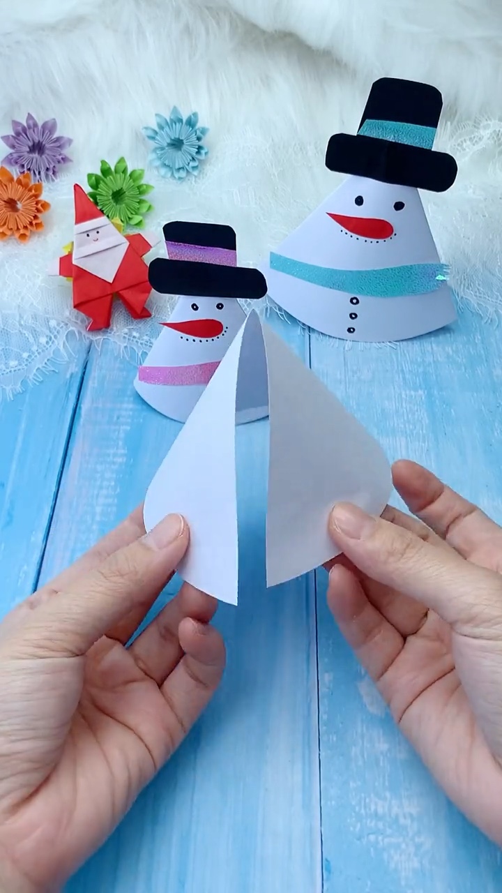 Step 1 Cutting and Shaping White Cardstock Cone Sector Template for Snowman