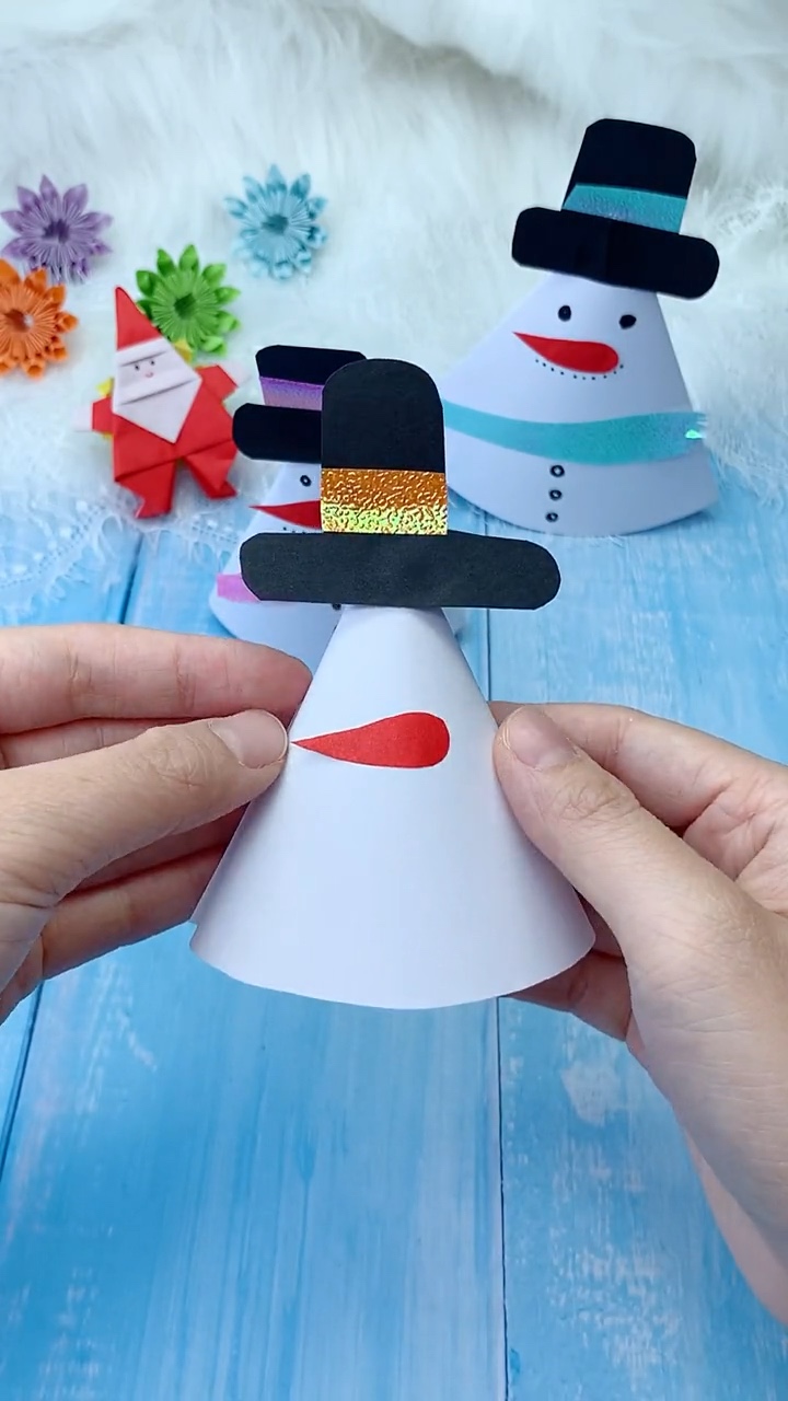 Step 4 Assembling and Gluing Black Top Hat and Orange Carrot Nose to Snowman