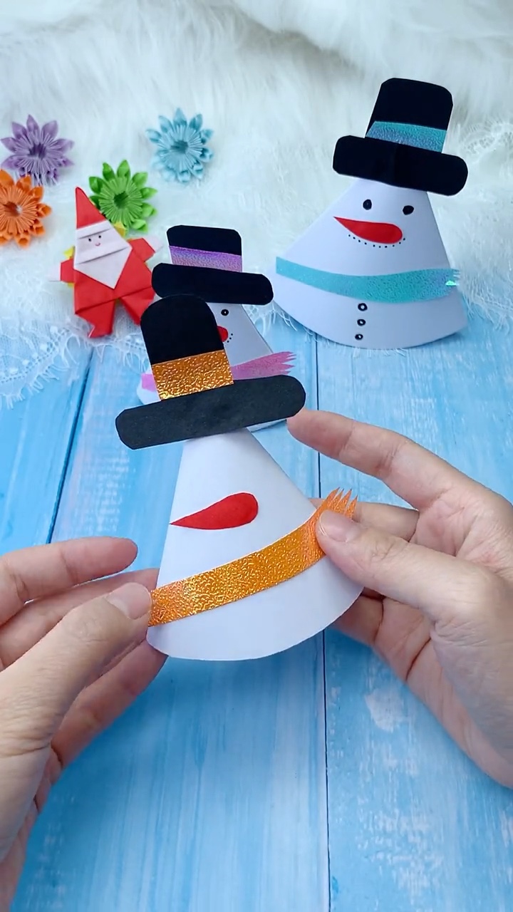 Step 5 Wrapping and Securing Glitter Scarf with Fringed Edges Around Snowman