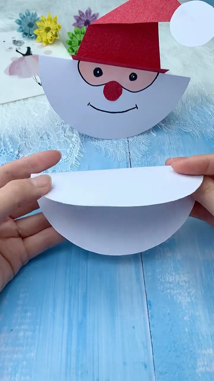 Step 1: Fold White Circular Cardstock in Half into Rocking Semicircle Base