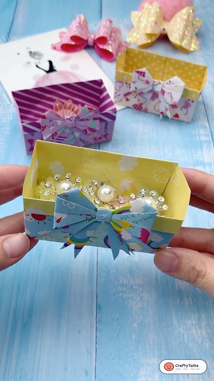 Origami Paper Gift Box with Bow Holding Jewelry and Sweets Finished Project