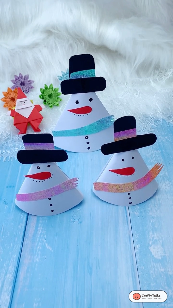 3D Paper Cone Snowman Christmas Craft Finished Trio on Wooden Table